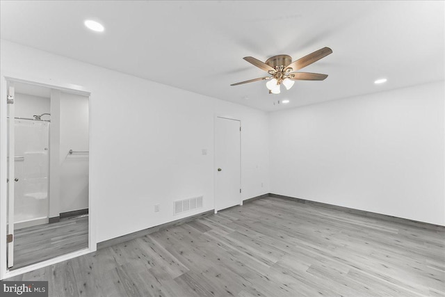 unfurnished bedroom featuring wood finished floors, recessed lighting, baseboards, and a ceiling fan