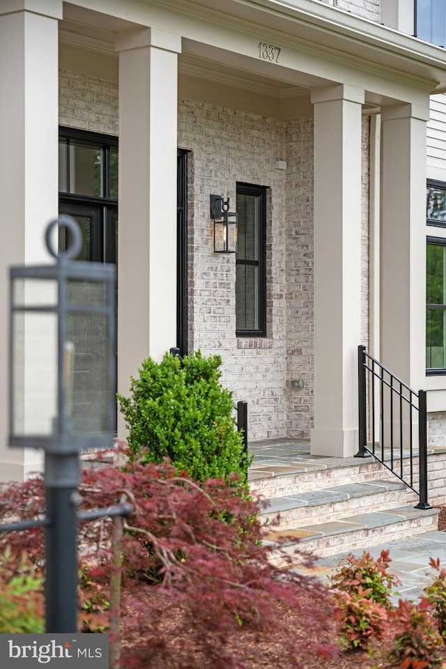 doorway to property with a porch