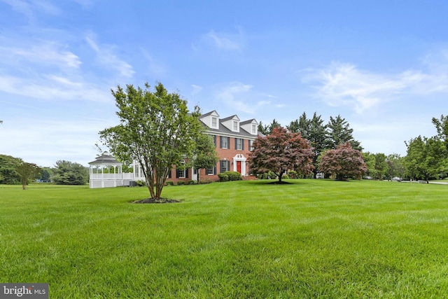 7103 Brookshire Ln, Clarksville, MD 21029 - view of front of property featuring brick siding and a front yard