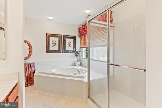 7103 Brookshire Ln, Clarksville, MD 21029 - full bathroom with a stall shower, tile patterned flooring, a garden tub, vanity, and recessed lighting