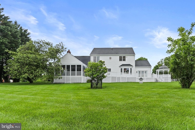 7103 Brookshire Ln, Clarksville, MD 21029 - rear view of property with a gazebo, a sunroom, and a lawn