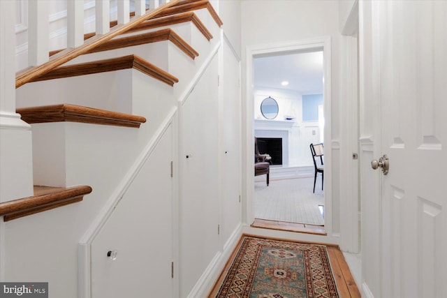 744 7th St SE, Washington, DC 20003 - corridor featuring stairs, wood finished floors, and recessed lighting