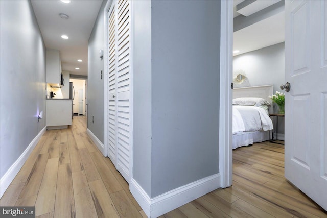 744 7th St SE, Washington, DC 20003 - hallway featuring light wood-style flooring, baseboards, and recessed lighting