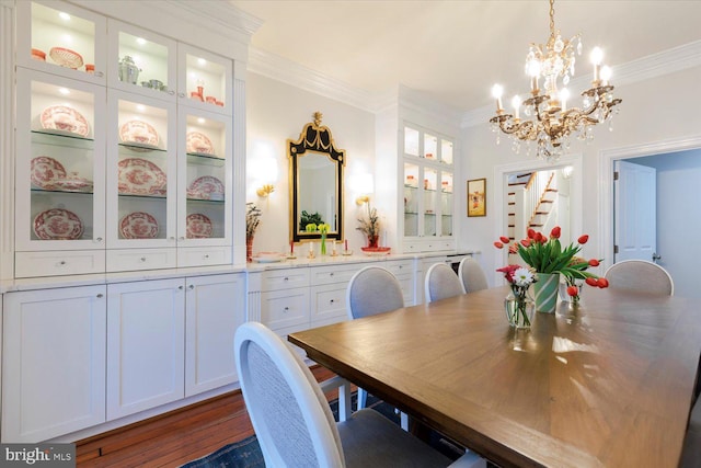 744 7th St SE, Washington, DC 20003 - dining space with a chandelier, ornamental molding, dark wood-style floors, and stairs