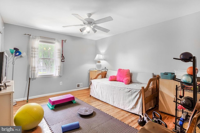 7750 Carrleigh Pkwy, Springfield, VA 22152 - bedroom with wood finished floors, baseboards, and a ceiling fan