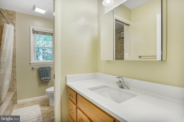 7750 Carrleigh Pkwy, Springfield, VA 22152 - bathroom with vanity, toilet, and shower / tub combo with curtain