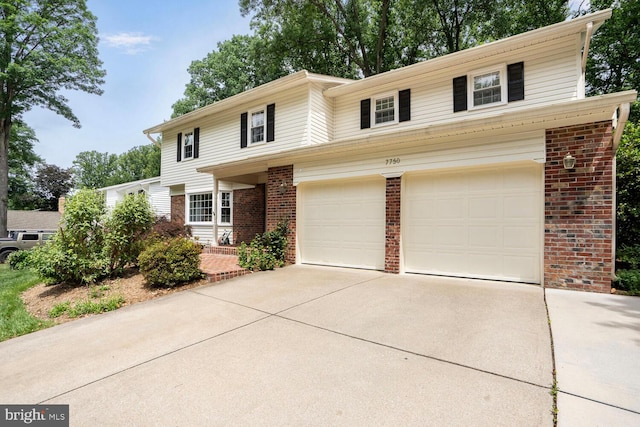 7750 Carrleigh Pkwy, Springfield, VA 22152 - traditional-style home with brick siding, driveway, and an attached garage