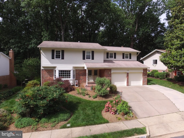 7750 Carrleigh Pkwy, Springfield, VA 22152 - traditional home featuring brick siding, driveway, a garage, and a front lawn