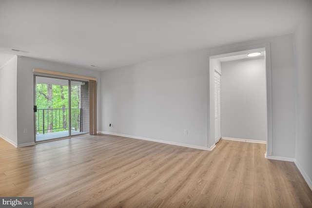 3320 Woodburn Village Dr Unit 32, Annandale, VA 22003 - spare room with light wood-style flooring and baseboards
