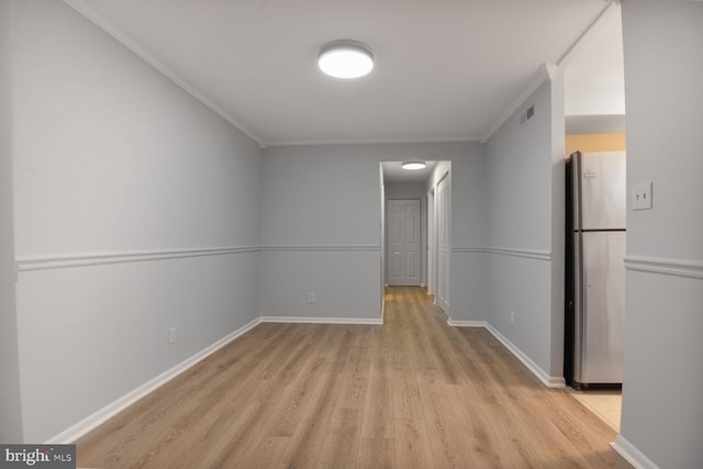 3320 Woodburn Village Dr Unit 32, Annandale, VA 22003 - spare room with light wood finished floors, ornamental molding, and baseboards
