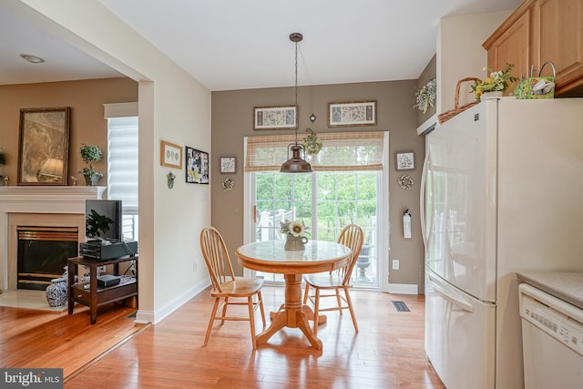 87 Chapel Hill Rd, Mount Laurel, NJ 08054 - dining space featuring light wood-style floors, baseboards, and a premium fireplace