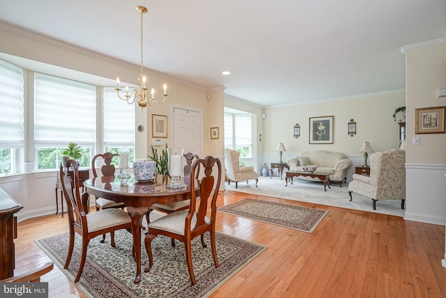 87 Chapel Hill Rd, Mount Laurel, NJ 08054 - dining space featuring healthy amount of natural light, a chandelier, light wood-style floors, and crown molding