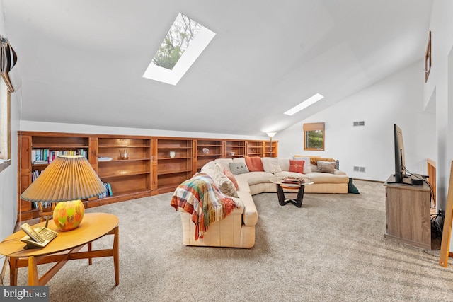 4 Fox Ridge Rd, Glenmoore, PA 19343 - carpeted living room with a skylight and vaulted ceiling