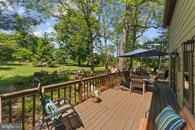 4 Fox Ridge Rd, Glenmoore, PA 19343 - wooden terrace with outdoor dining space, a lawn, and view of scattered trees