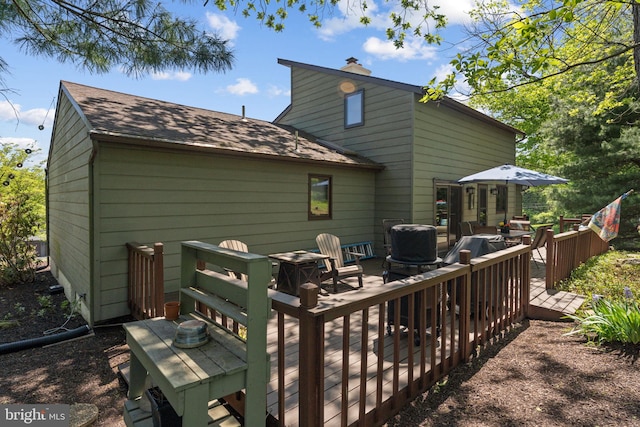 4 Fox Ridge Rd, Glenmoore, PA 19343 - rear view of house featuring a wooden deck, a chimney, roof with shingles, and outdoor lounge area
