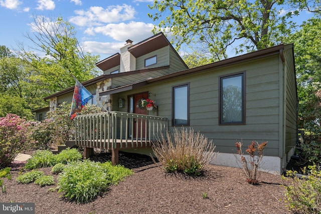 4 Fox Ridge Rd, Glenmoore, PA 19343 - view of front of house featuring a wooden deck and a chimney