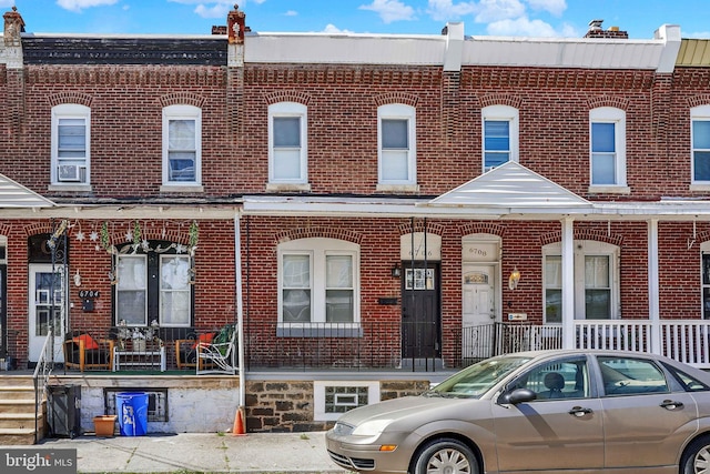 6706 Marsden St, Philadelphia, PA 19135 - townhome / multi-family property with brick siding and covered porch