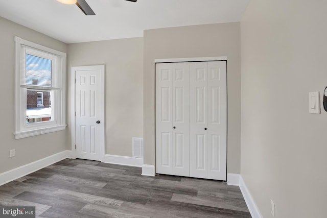 6706 Marsden St, Philadelphia, PA 19135 - unfurnished bedroom featuring wood finished floors, baseboards, a closet, and ceiling fan