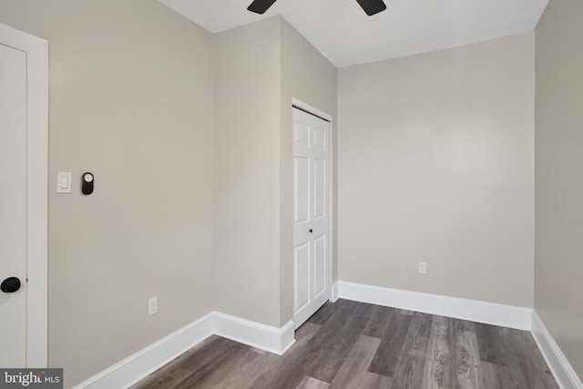 6706 Marsden St, Philadelphia, PA 19135 - unfurnished bedroom with dark wood finished floors, baseboards, a closet, and ceiling fan