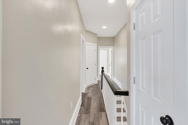 6706 Marsden St, Philadelphia, PA 19135 - corridor featuring an upstairs landing, dark wood-style flooring, and baseboards