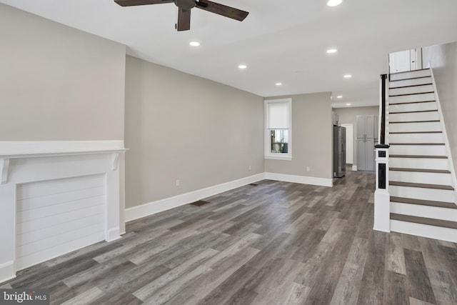 6706 Marsden St, Philadelphia, PA 19135 - unfurnished living room featuring a ceiling fan, stairway, dark wood-type flooring, baseboards, and recessed lighting