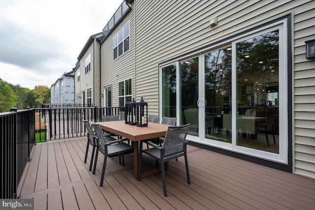 42152 Stone Press Ter, Brambleton, VA 20148 - wooden terrace featuring outdoor dining area