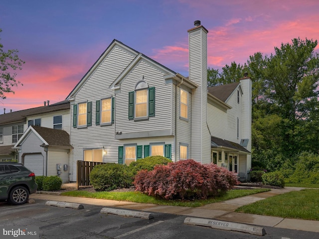 411 Stonebridge Blvd, New Castle, DE 19720 - view of front of property with a chimney and uncovered parking
