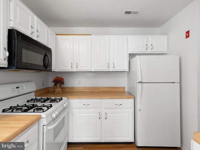 411 Stonebridge Blvd, New Castle, DE 19720 - kitchen with white appliances and white cabinets