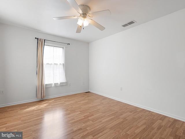 411 Stonebridge Blvd, New Castle, DE 19720 - unfurnished room featuring light wood-style flooring, a ceiling fan, and baseboards