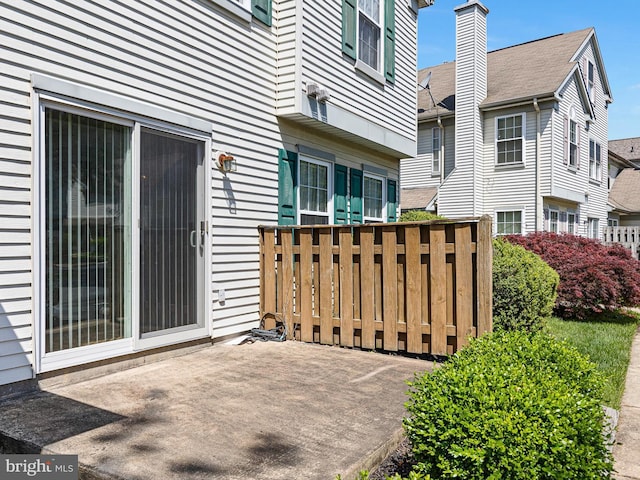 411 Stonebridge Blvd, New Castle, DE 19720 - entrance to property with a patio and a chimney
