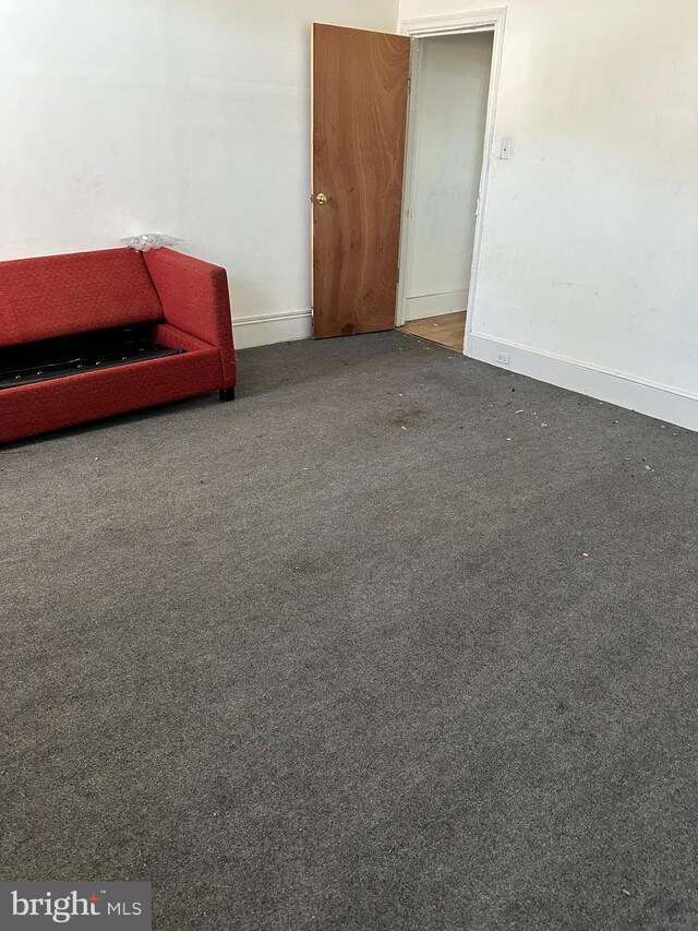 641 N 56th St, Philadelphia, PA 19131 - spare room featuring baseboards and carpet