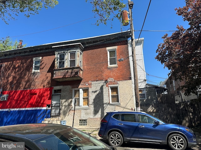 641 N 56th St, Philadelphia, PA 19131 - townhome / multi-family property featuring brick siding
