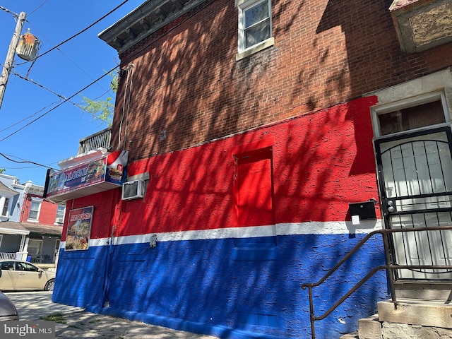 641 N 56th St, Philadelphia, PA 19131 - view of side of property with brick siding