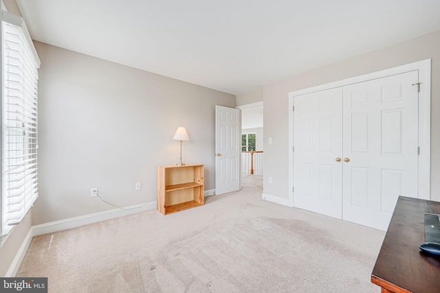 38452 Millstone, Purcellville, VA 20132 - unfurnished bedroom featuring a closet, baseboards, and carpet flooring