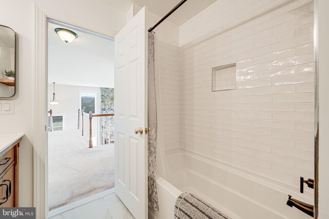 38452 Millstone, Purcellville, VA 20132 - bathroom featuring marble finish floors, shower / tub combo with curtain, and vanity