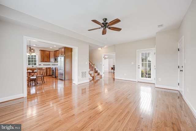 38452 Millstone, Purcellville, VA 20132 - living area with a ceiling fan, plenty of natural light, light wood-type flooring, and stairs