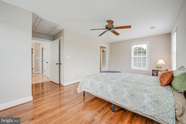 38452 Millstone, Purcellville, VA 20132 - bedroom with attic access, wood finished floors, baseboards, and ceiling fan