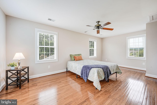 38452 Millstone, Purcellville, VA 20132 - bedroom featuring multiple windows, light wood-type flooring, baseboards, and ceiling fan