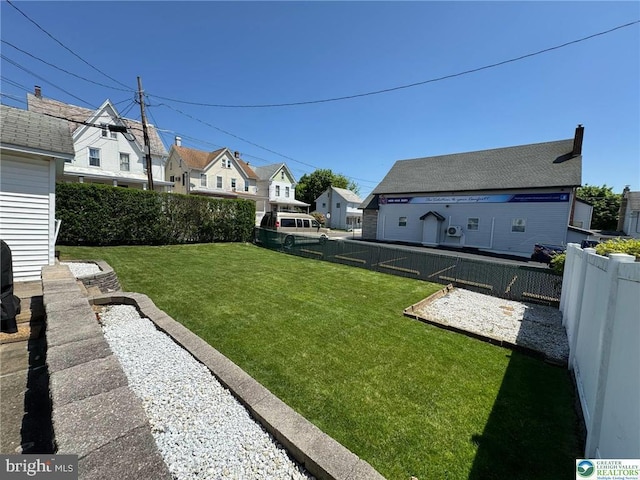 view of yard featuring a residential view