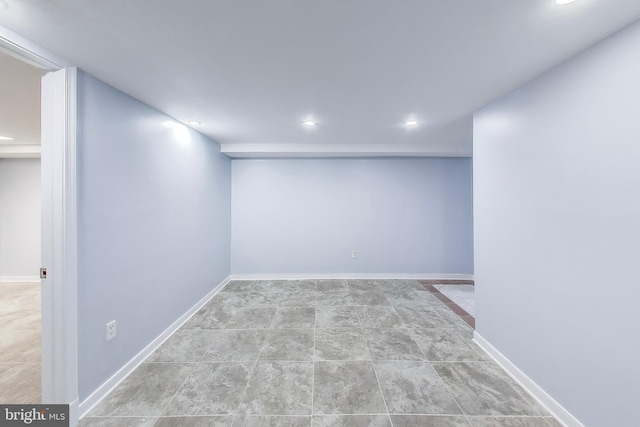 finished below grade area with recessed lighting and baseboards