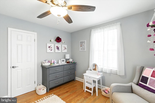 8907 Mavis Ave, Baltimore, MD 21236 - sitting room with light wood finished floors, a ceiling fan, and baseboards