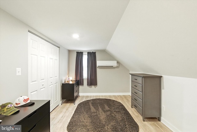 8907 Mavis Ave, Baltimore, MD 21236 - additional living space featuring a wall mounted AC, light wood finished floors, baseboards, and lofted ceiling