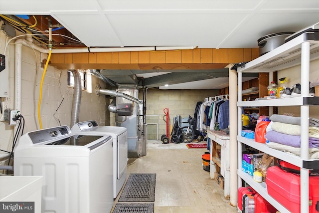 8907 Mavis Ave, Baltimore, MD 21236 - clothes washing area with washer and clothes dryer and heating unit