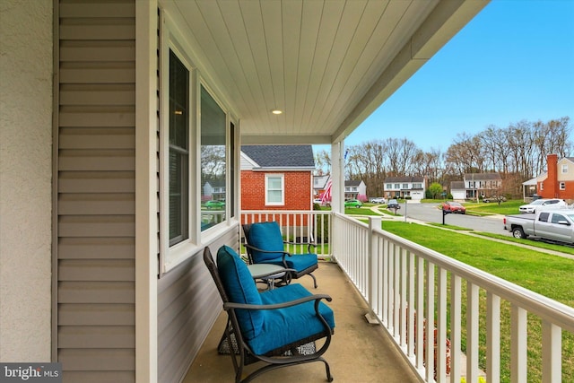 8907 Mavis Ave, Baltimore, MD 21236 - balcony with covered porch and a residential view
