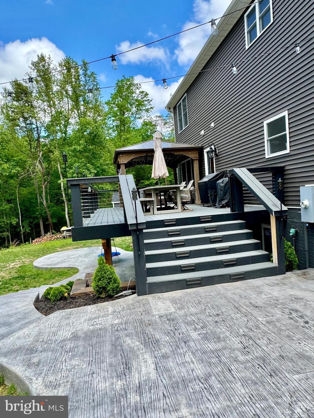 wooden deck featuring stairs