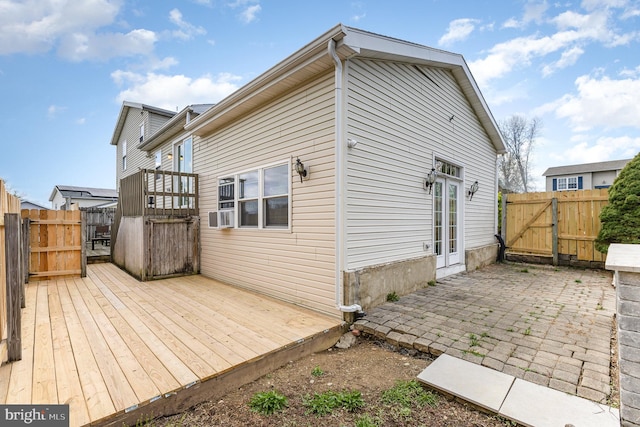 8838 Mckinley Ct, Hummelstown, PA 17036 - view of property exterior with a gate, a wooden deck, a fenced backyard, and a patio area