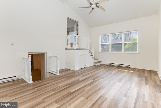 8838 Mckinley Ct, Hummelstown, PA 17036 - unfurnished living room with baseboard heating, light wood-type flooring, high vaulted ceiling, a ceiling fan, and baseboards