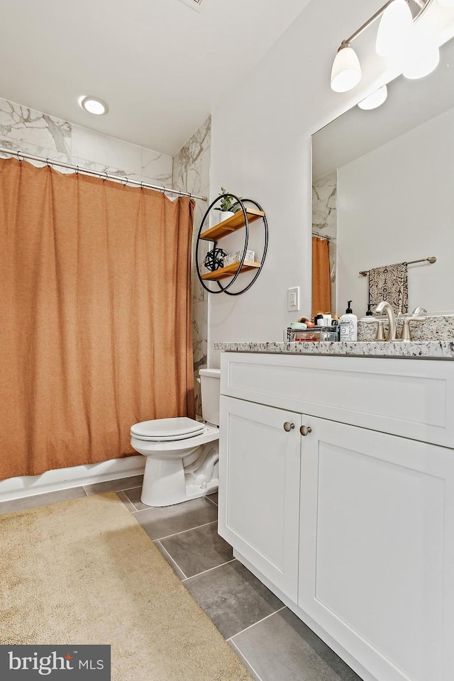 419 S E Ave, Baltimore, MD 21224 - full bath featuring vanity, toilet, and tile patterned floors