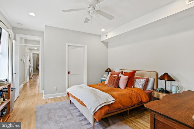 419 S E Ave, Baltimore, MD 21224 - bedroom with light wood-type flooring, recessed lighting, a ceiling fan, and baseboards