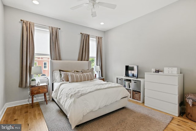 419 S E Ave, Baltimore, MD 21224 - bedroom featuring multiple windows, light wood-style flooring, baseboards, recessed lighting, and ceiling fan